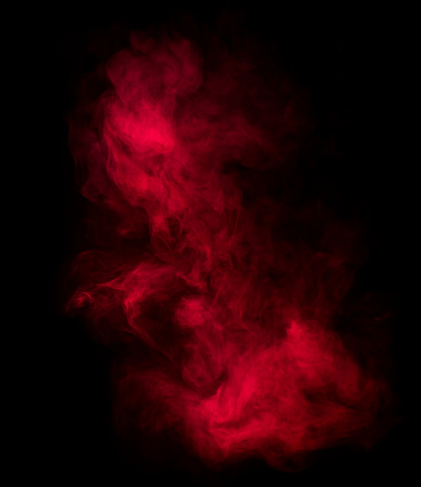 red smoke shapes isolated on black background