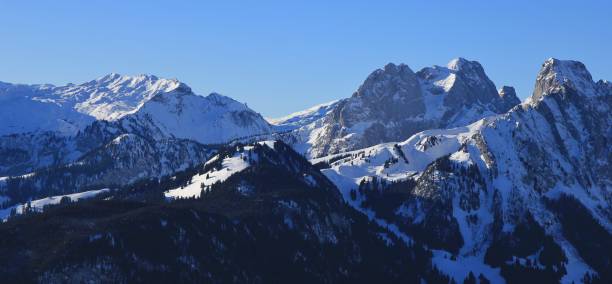Snow covered mountains Gummfluh and Le Rubli