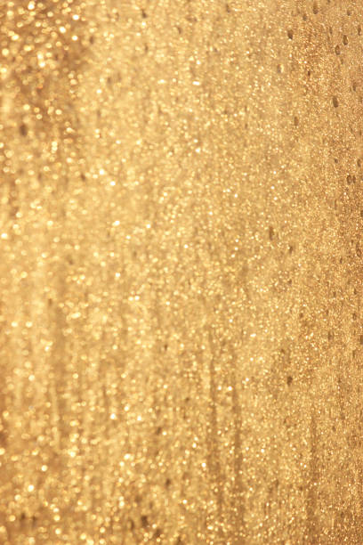 istock Abstract gold glitter background. Twinkled texture. Bokeh lights. 641039918