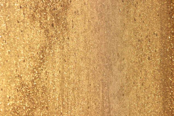 istock Abstract gold glitter background. Twinkled texture. Bokeh lights. 641039946