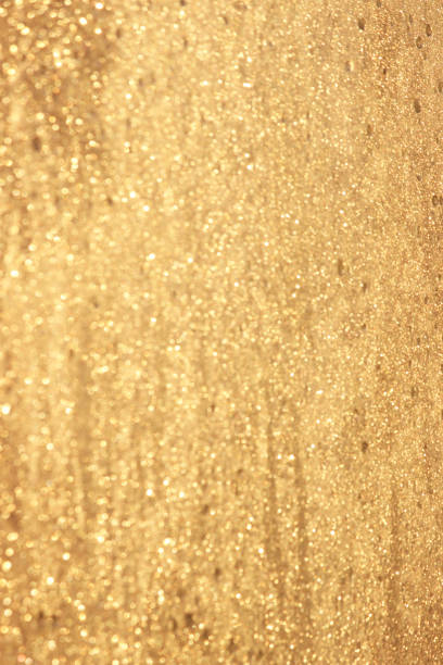 istock Abstract gold glitter background. Twinkled texture. Bokeh lights. 641040008