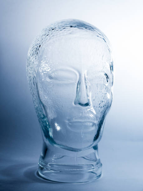 Transparent Glass Head on white and blue background