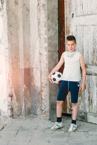 istock Boy with soccer ball. 641041112