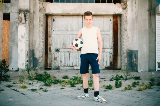istock Boy with soccer ball. 641041126