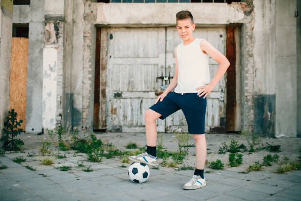 istock Boy with soccer ball. 641041140