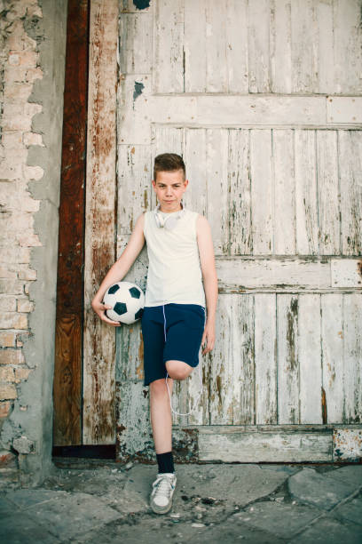 istock Boy with soccer ball. 641041142