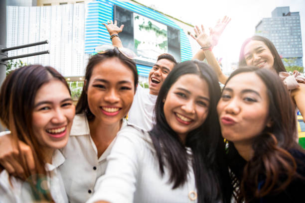 istock Thai friends hanging out in downtown Bangkok 641042882