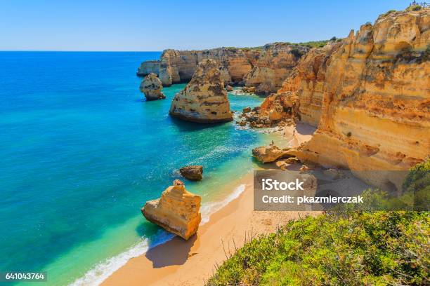 View Of Beautiful Marinha Beach With Crystal Clear Turquoise Water Near Carvoeiro Town Algarve Region Portugal Stock Photo - Download Image Now
