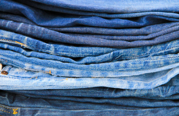 istock Stack of the blue jeans close-up 641046088