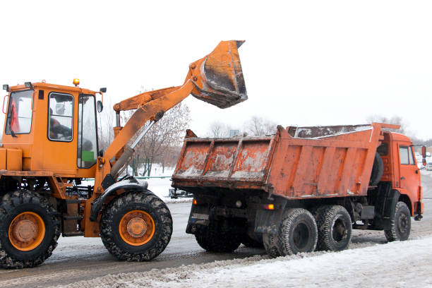 istock excavator clears snow from roads 641047886