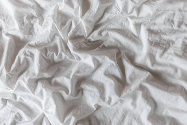 istock Background of white wrinkled cotton blanket 641052866