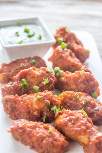 istock Fried chicken wings with blue cheese sauce 641054130