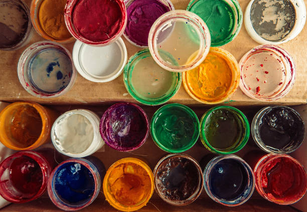 istock Gouache paint jars. Tools for creative work. Paintings Art Concept. Top view 641060912