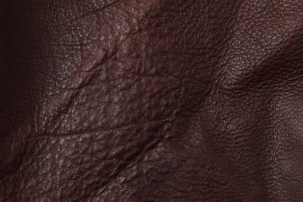 istock Genuine natural dark brown leather texture. 641061470