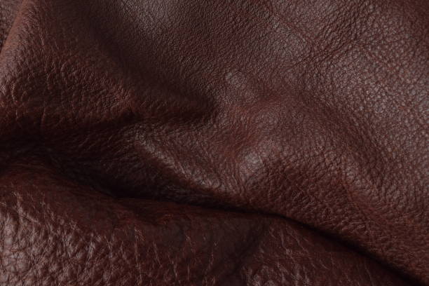 istock Genuine natural dark brown leather texture. 641061790