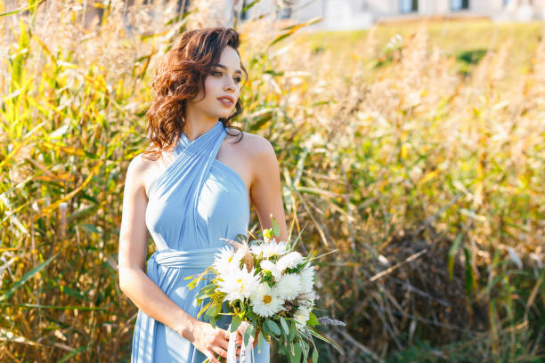 istock Beautiful young bridesmaid with curly hair 641064840