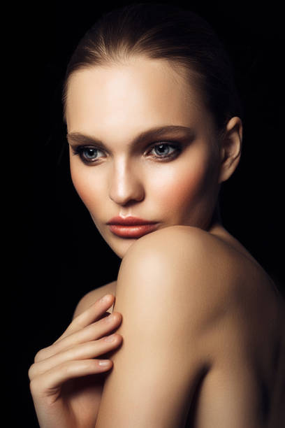istock Beautiful woman on dark background 641064888