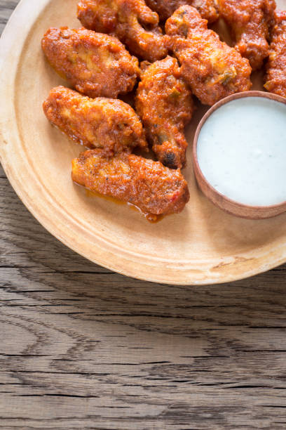 istock Fried chicken wings with blue cheese sauce 641065074