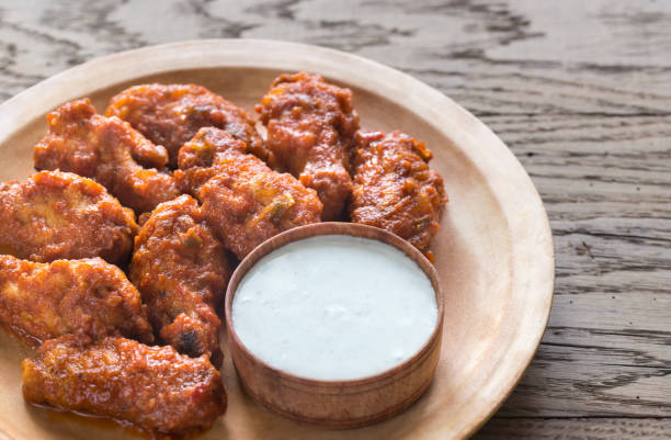 istock Fried chicken wings with blue cheese sauce 641065098