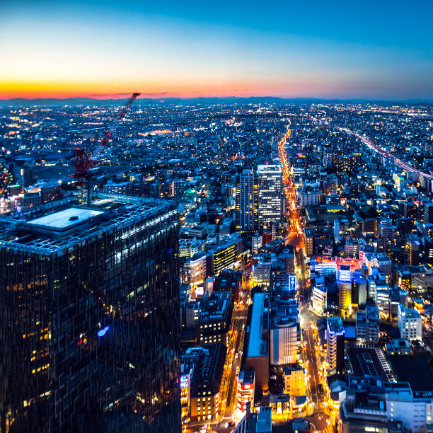 Aerial view to the city at sunset time.