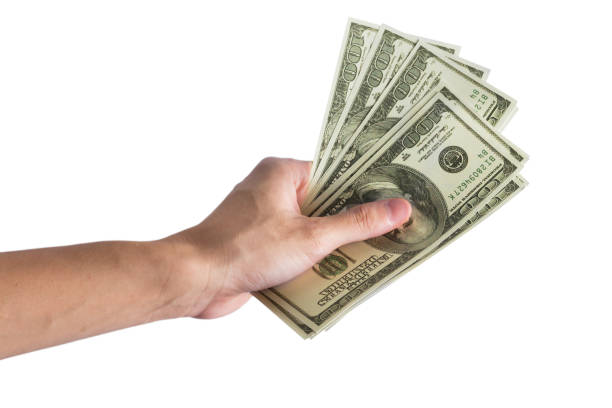 istock Hand man pick up money dollar 641068644