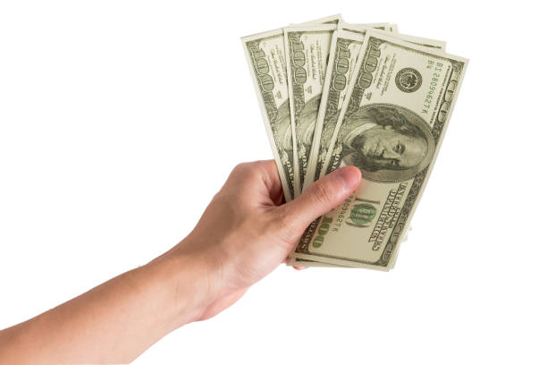 istock Hand man pick up money dollar 641068652