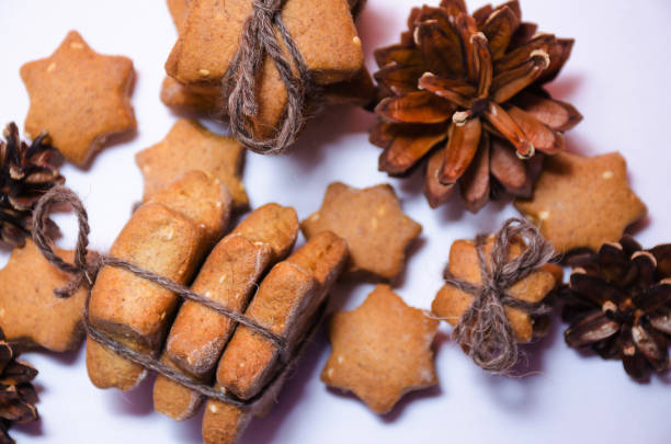 istock Homemade rye cookies star shaped stack tied with brown rope 641074310