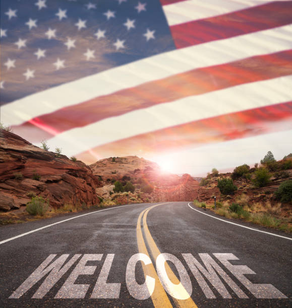 istock Empty Road with WELCOME text and USA flag 641080640