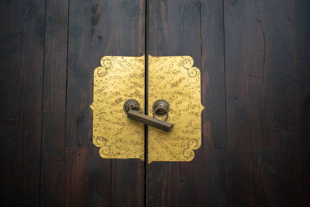 Chinese old styled iron lock on wooden door