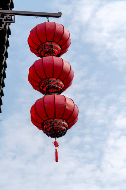 istock Chinese red lanterns hanging in the sky 641081042