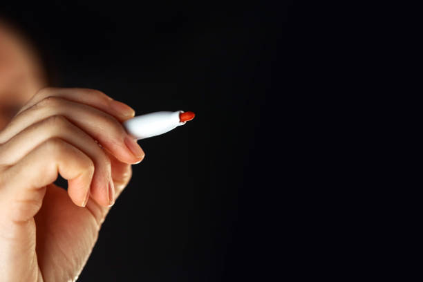 istock Female hand with marker pen and copy space 641082908