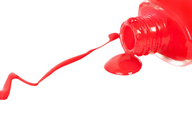istock Red nail polish spilled. Isolated on white. 641083048