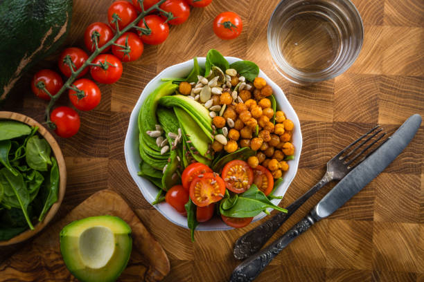 istock Vegeterian buddha bowl - balanced meat with spinach, chicken pea and avocado 641085598