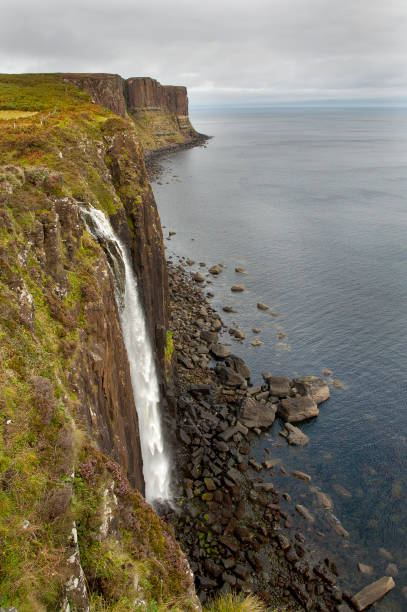 istock Scottish waterfall pouring into the sea 641086126