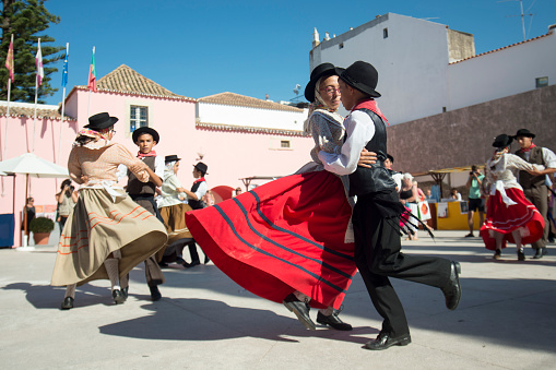 traditional portugese Dance at the Saturday Market in the town of Loule in the Algarve in the south of Portugal in Europe.