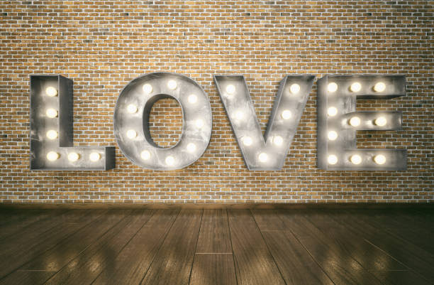 istock Retro LOVE bulb sign on the wall 641091436