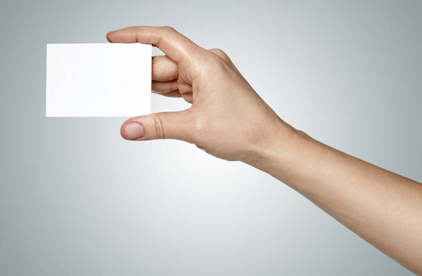 istock woman hand holding a card 641096806