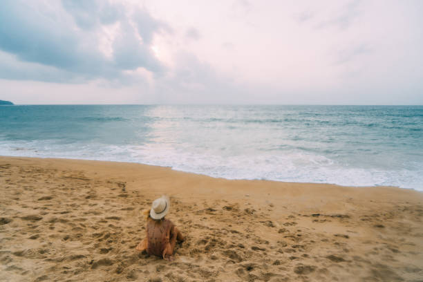 istock Woman on the beach in Thailand 641112530