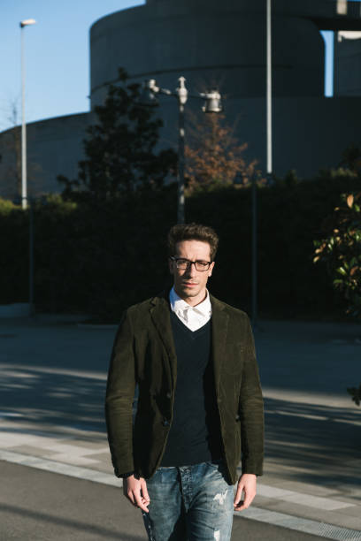 istock Handsome man posing in the street 641114022