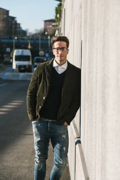 istock Handsome man posing in the street 641114056