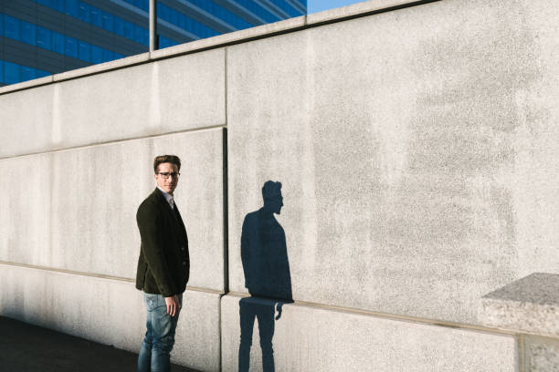 istock Handsome man posing in the street 641114082