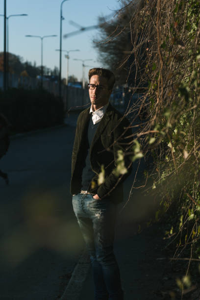 istock Handsome man posing in the street 641114088
