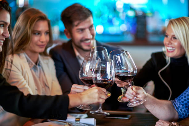 istock People celebrating in the restaurant 641114546