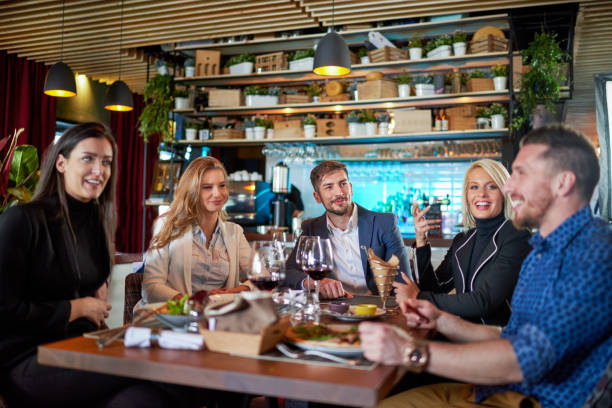 istock People celebrating in the restaurant 641114844