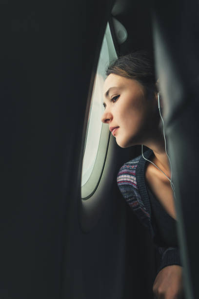 istock Woman in the plane 641116526