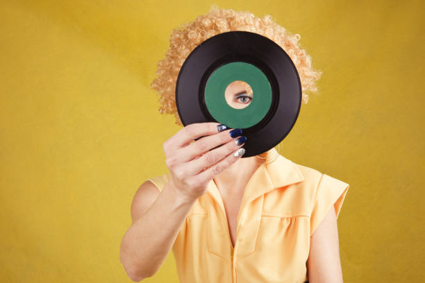 70's Disco Woman Looking Through 45 Record