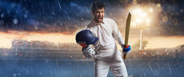 istock Cricket: Happy batsman on the stadium 641118676