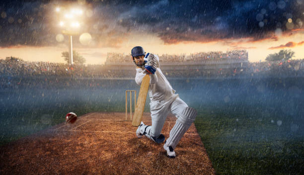 istock Cricket: Batsman on the stadium in action 641118706