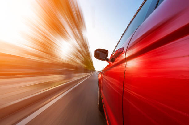 istock car on the road with motion blur background. 641118780