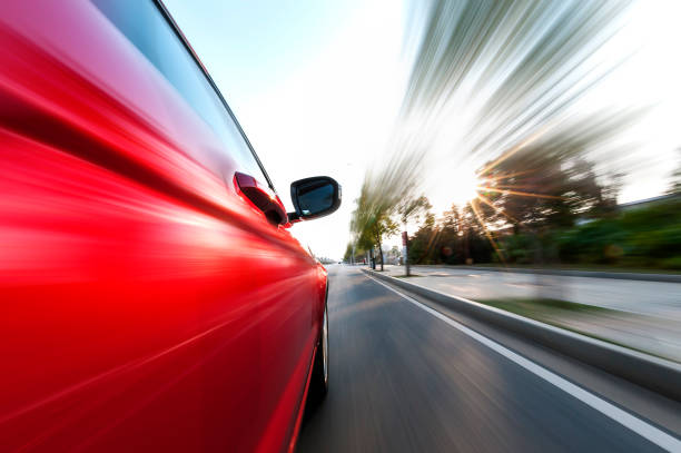 istock car on the road with motion blur background. 641118806
